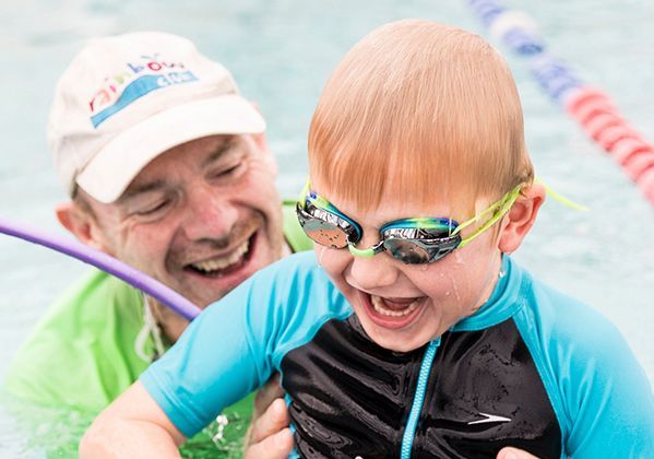 Child With Special Needs Receiving Swimming Lessons - Hydrotherapy in Croudance Bay, NSW