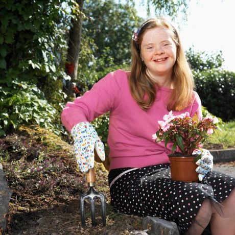Intellectual disabilities girl gardens
