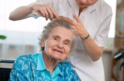 Caregiver providing personal care