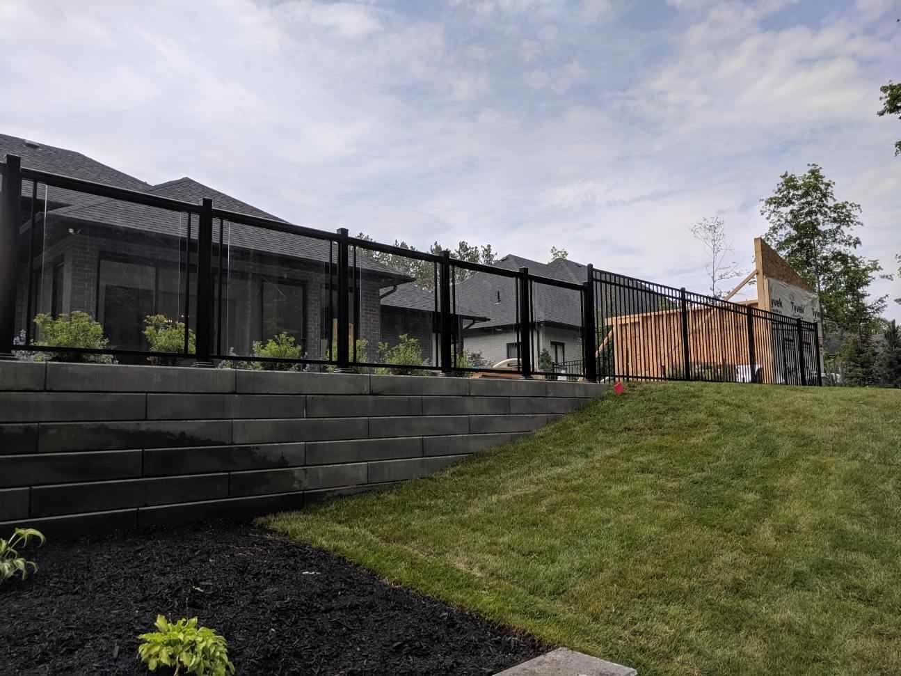 black aluminum and glass railing