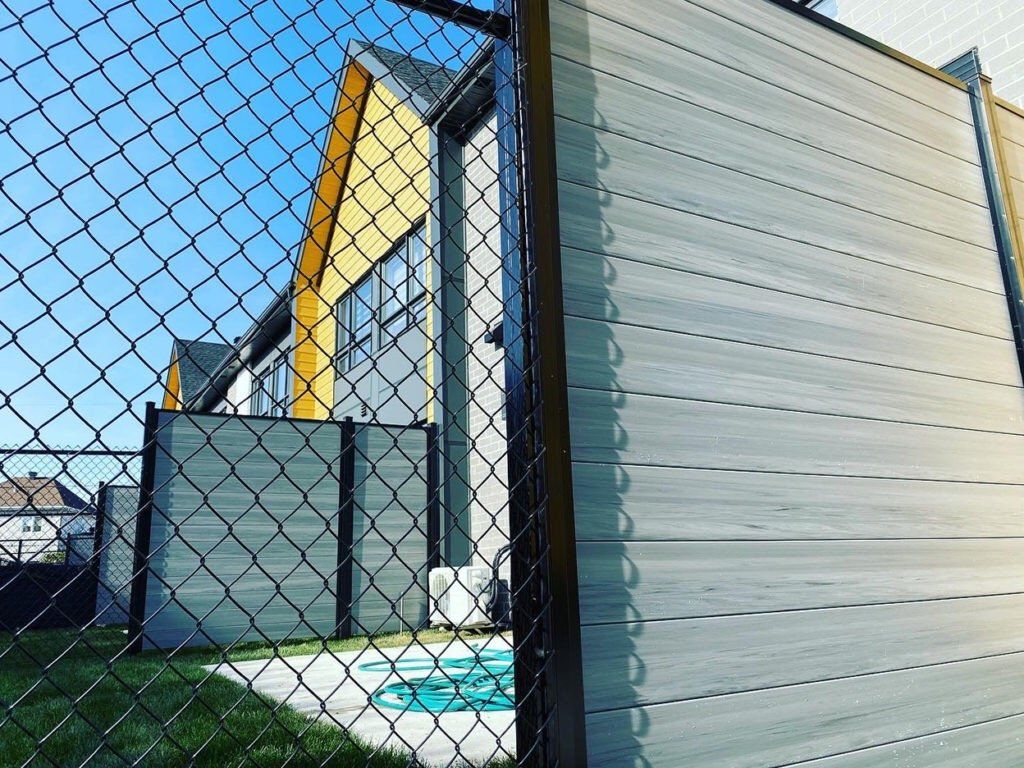 black aluminum frame with horizontal chai gray vinyl boards privacy screen