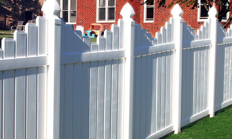 white vinyl picket fence