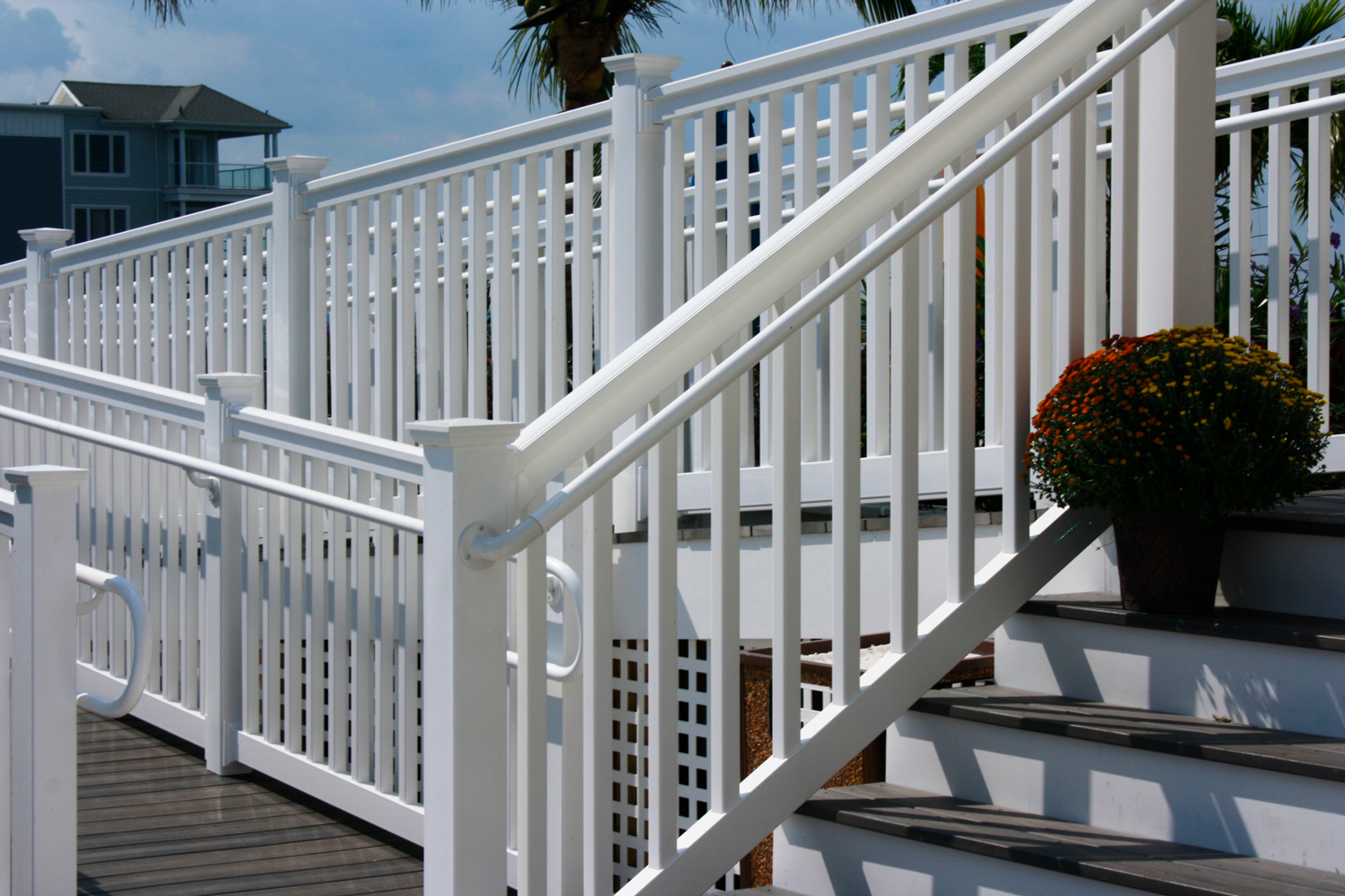 vinyl railing with white secondary hand rail