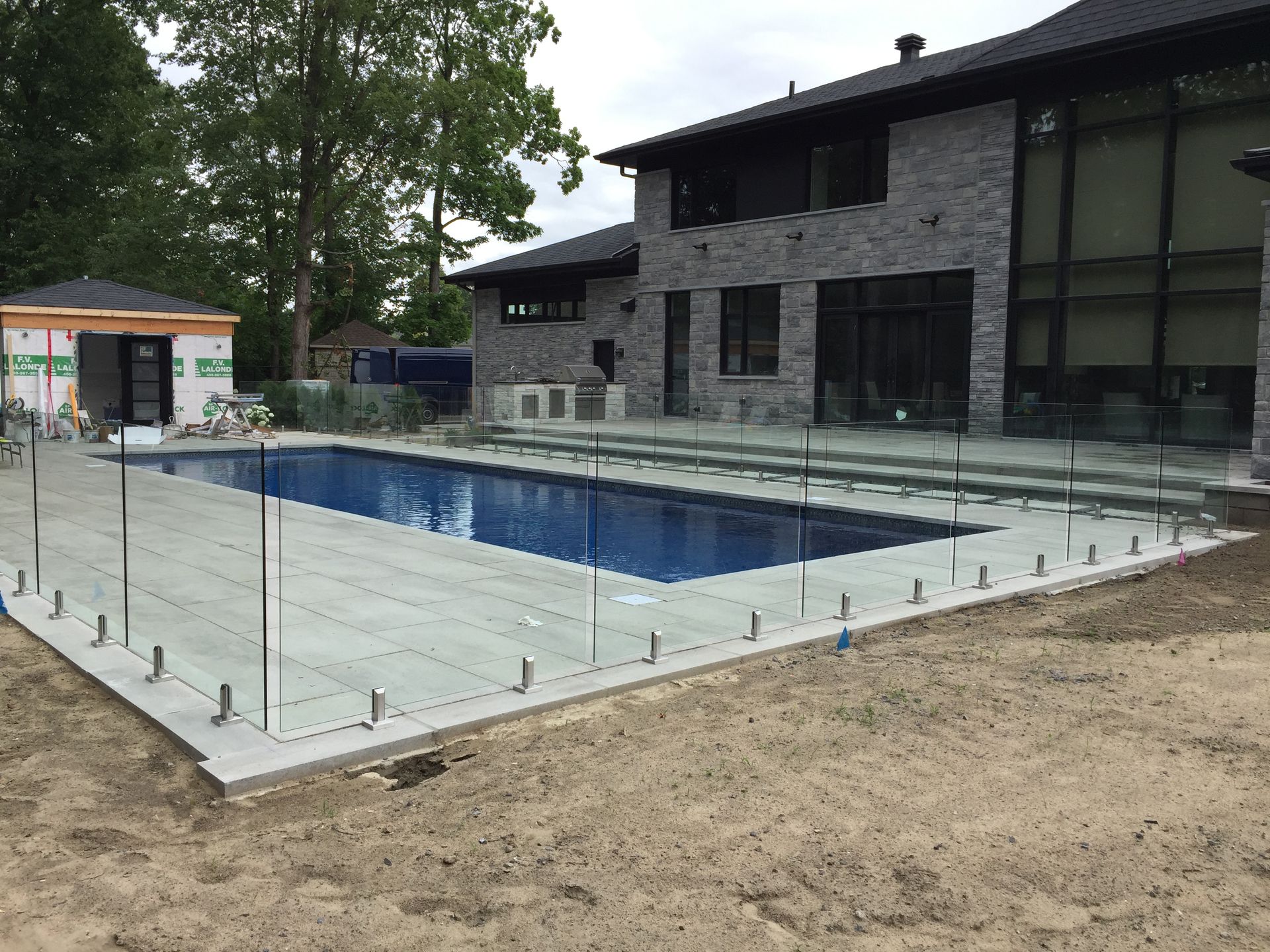 glass railing around a pool