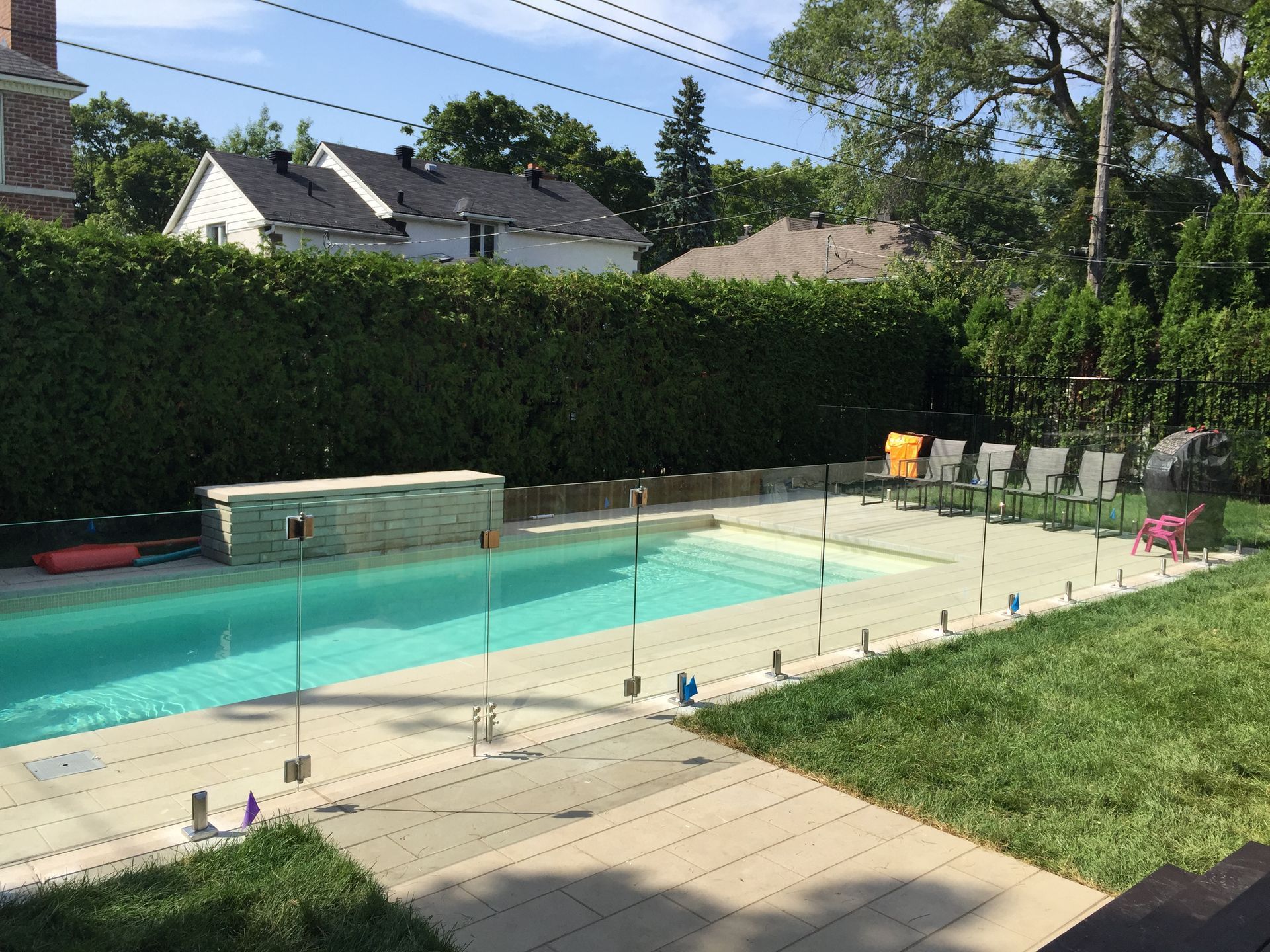 glass railing around a pool