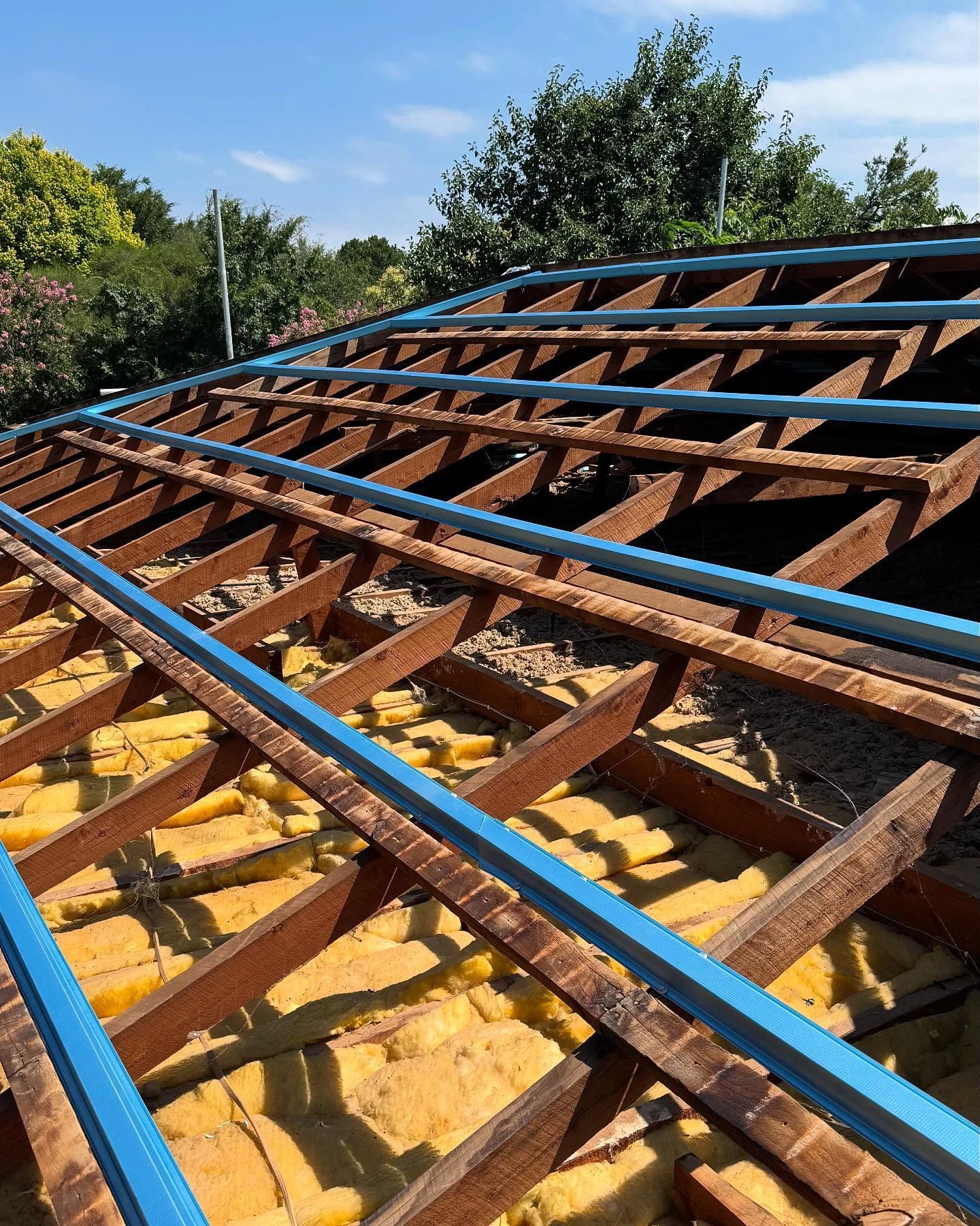 Roof Under Construction: Exposed Wooden Rafters — Ace Metal Roofing in Waterview Heights, NSW
