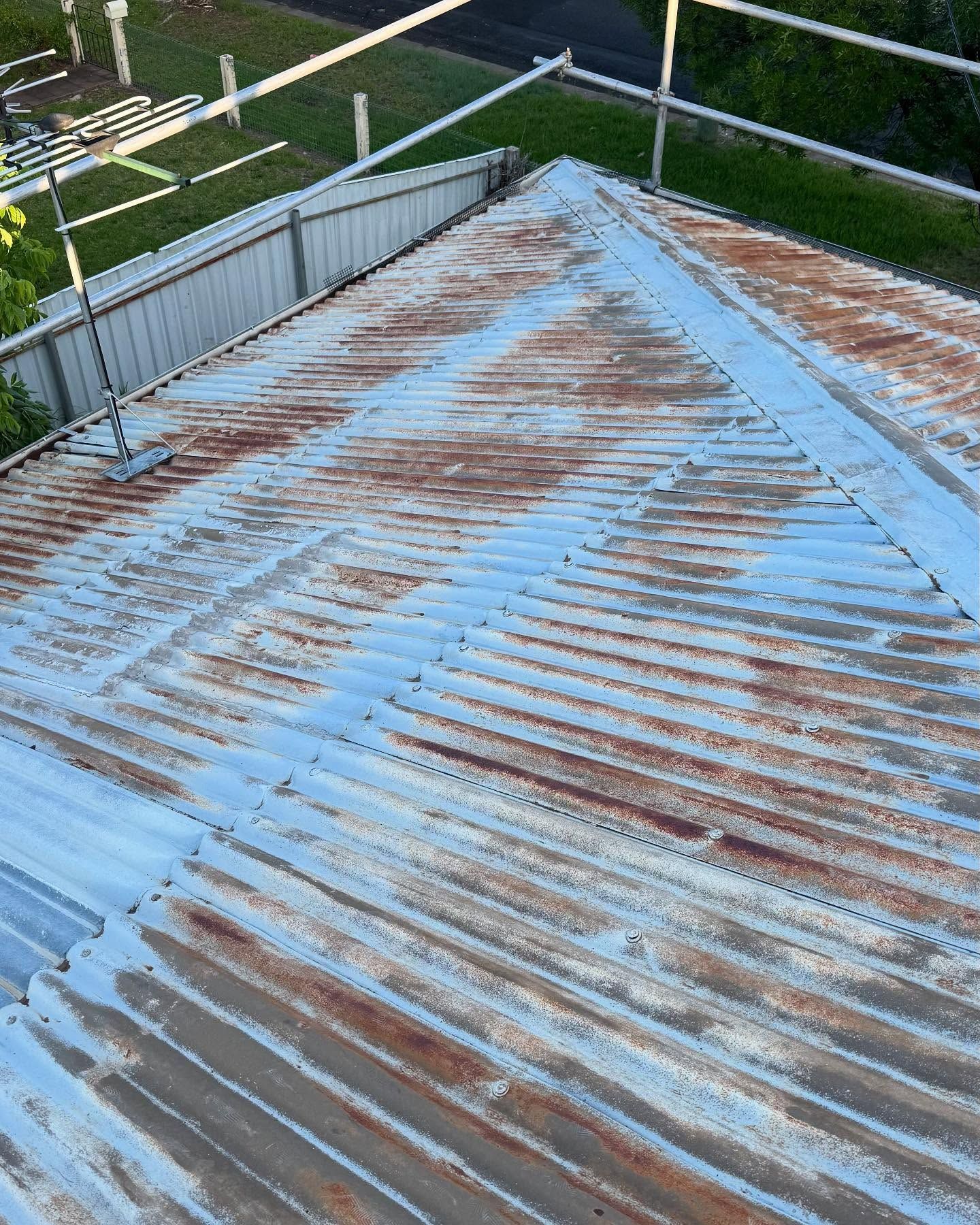 Rusty Corrugated Metal Roof With Visible Rust Streaks — Ace Metal Roofing in Waterview Heights, NSW