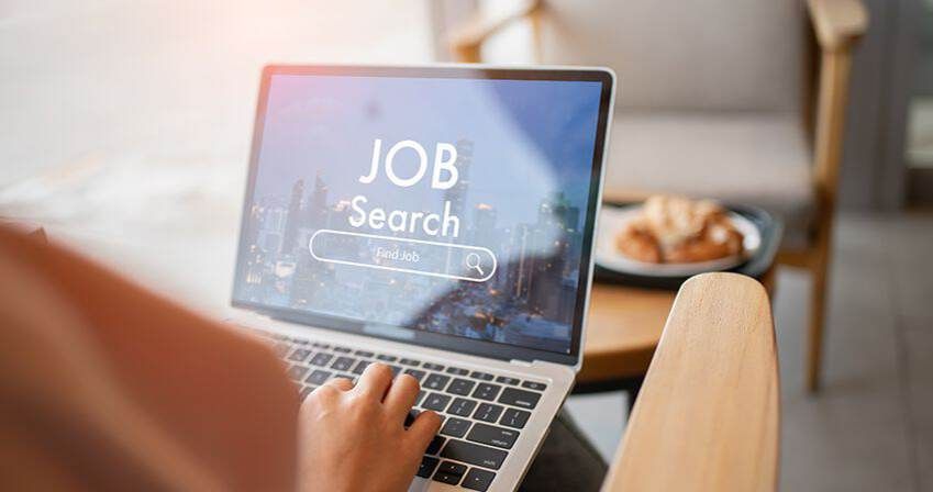 A person using a laptop with a 