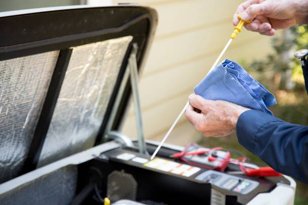 Worker checking the HVAC unit