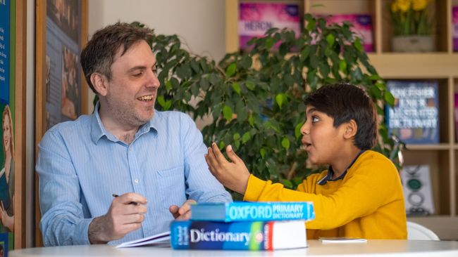tutor with student