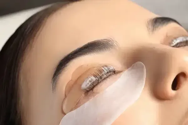 Woman receiving lash lift treatment in Temecula
