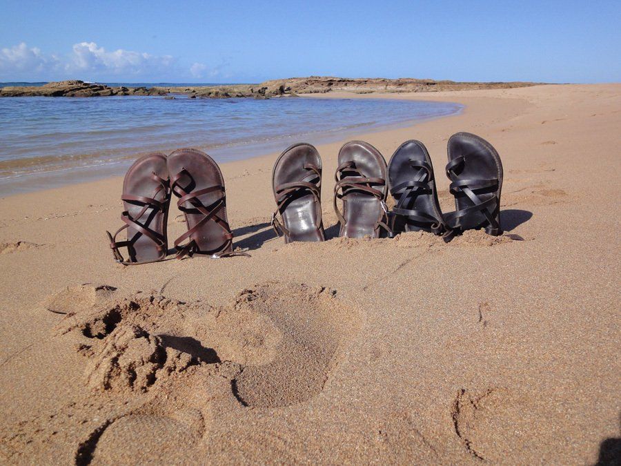 handmade leather sandals on the beach in Hawaii