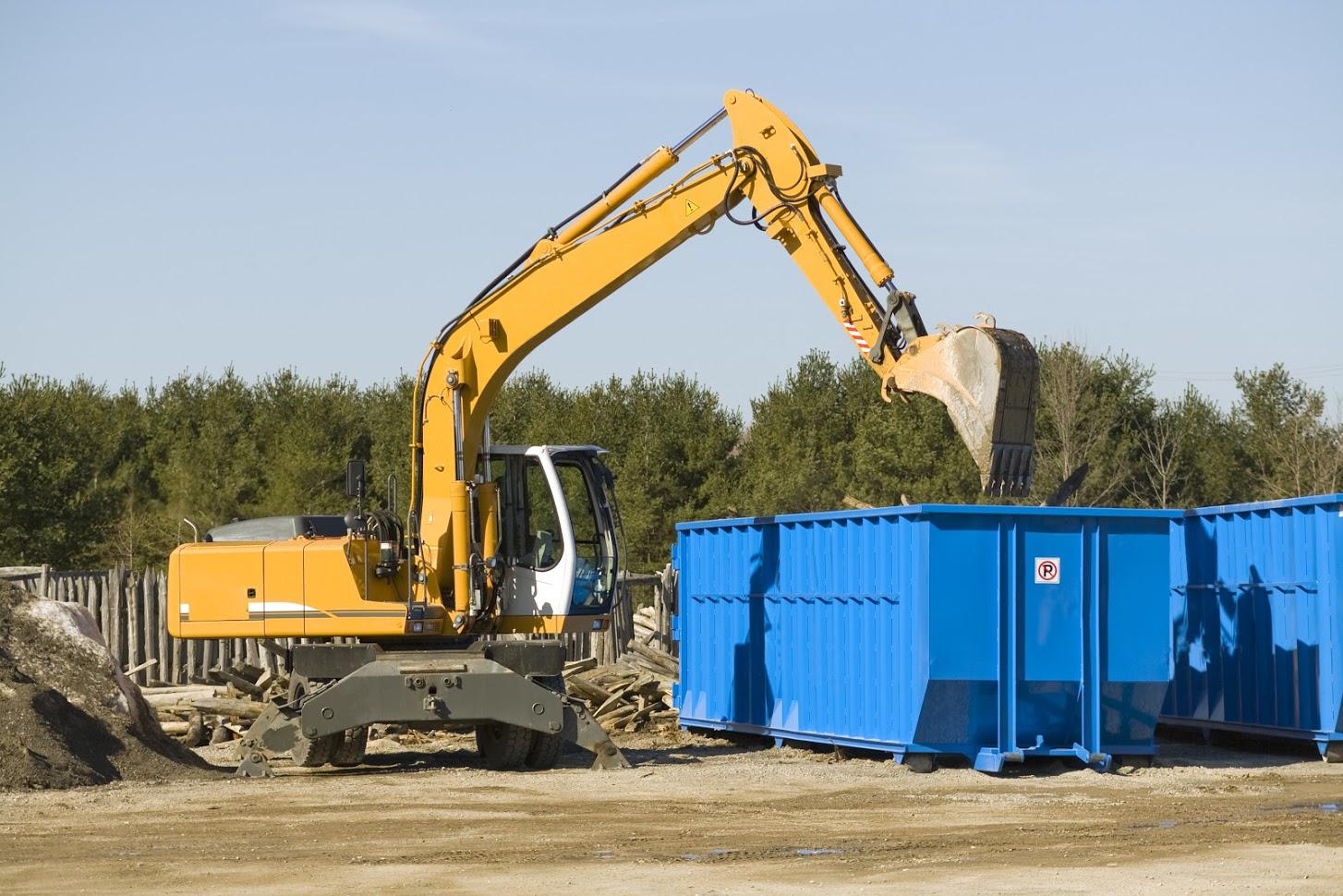 Dumpsters — Backhoe in a Dumpsters in Naples FL