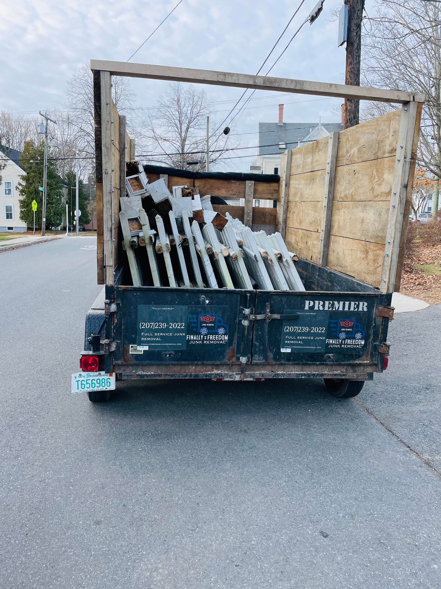 old fence loaded in trailer
