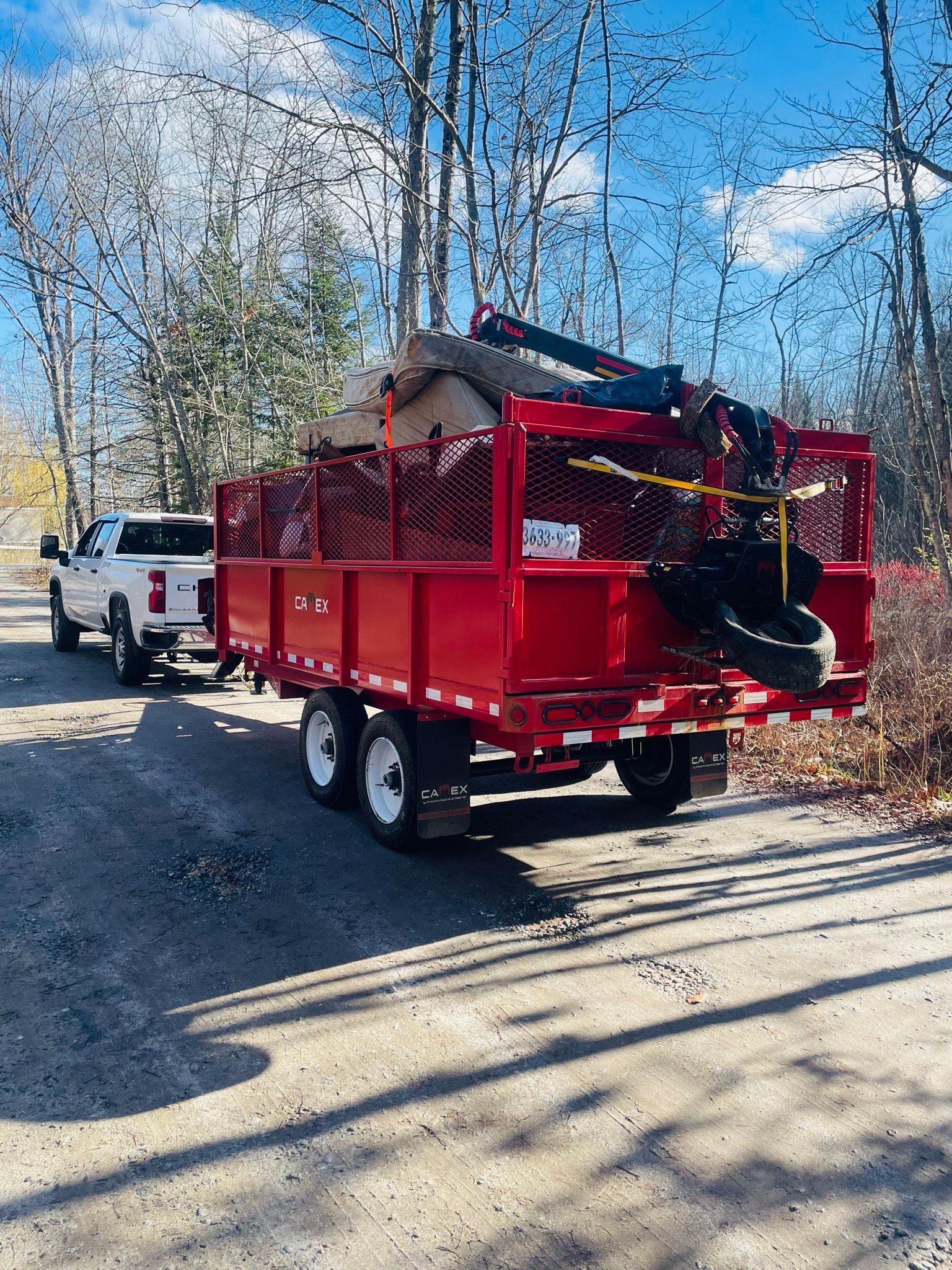 Finally Freedom Junk Removal hauling away a truck-load of junk