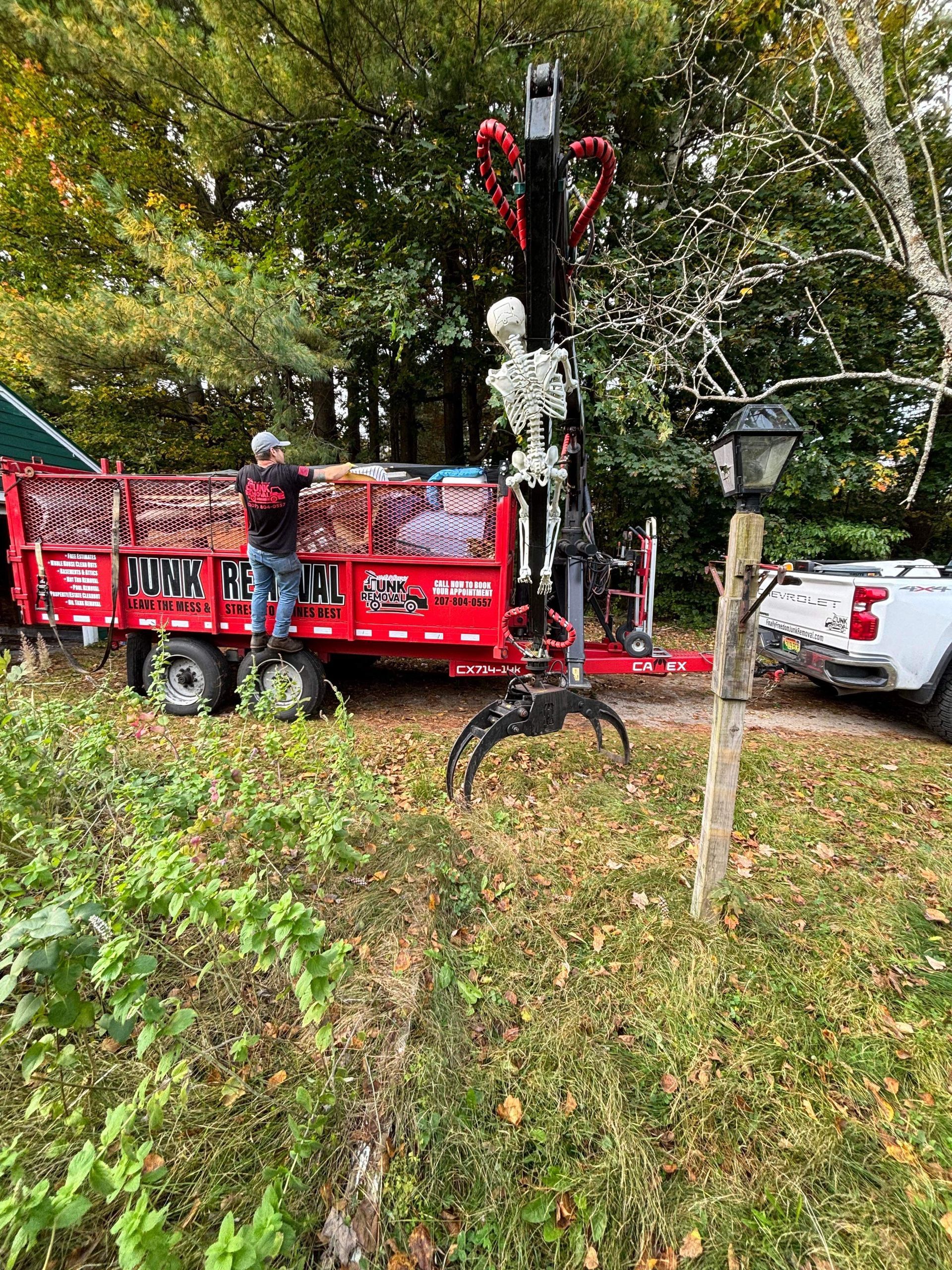 Finally Freedom Junk Removal using their crane