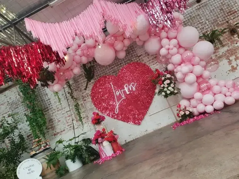 Balloon Arches and Shimmer Wall