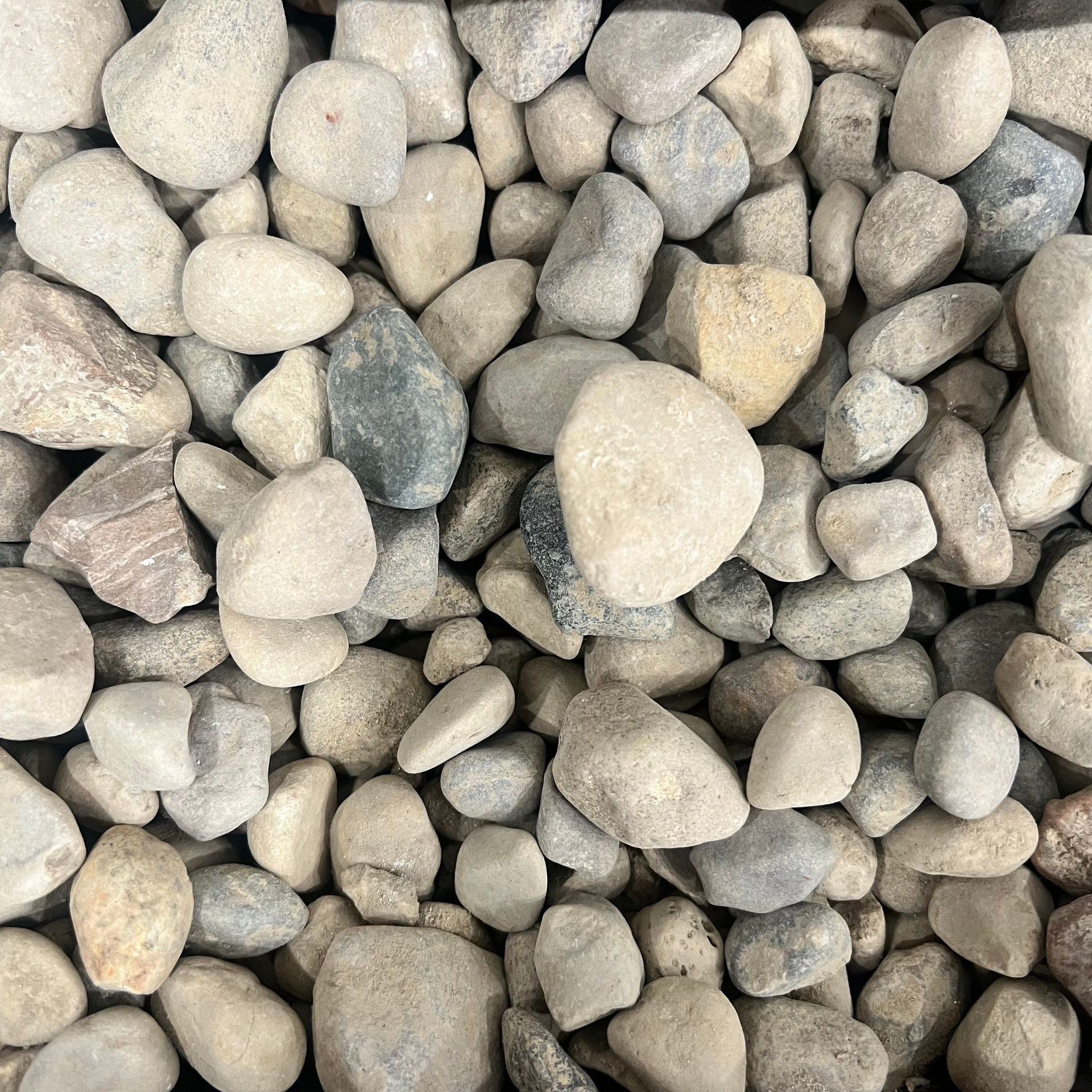 A pile of rocks of different sizes and shapes