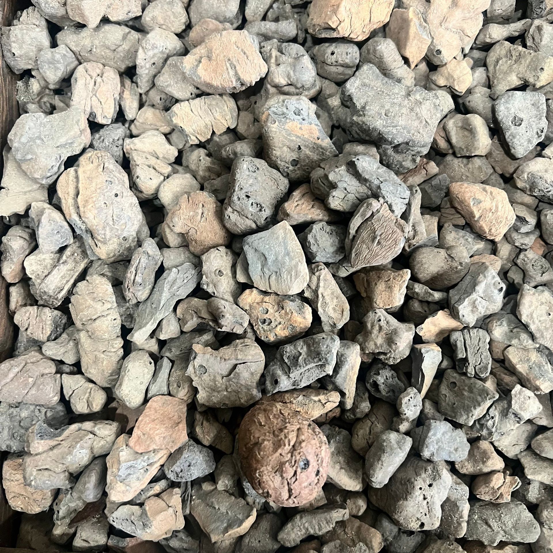 A pile of rocks sitting on top of each other on a table.