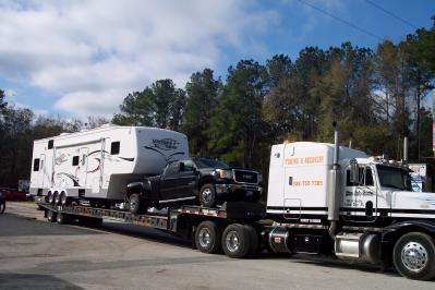 Professional Truck Repair Shop — Vehicle on Tow in Lake City, FL