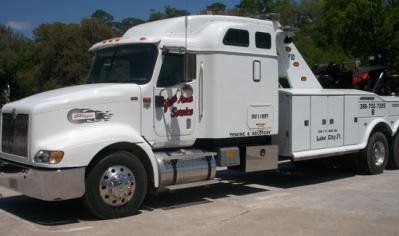 Professional Auto Mechanic — Large White Vehicle in Lake City, FL