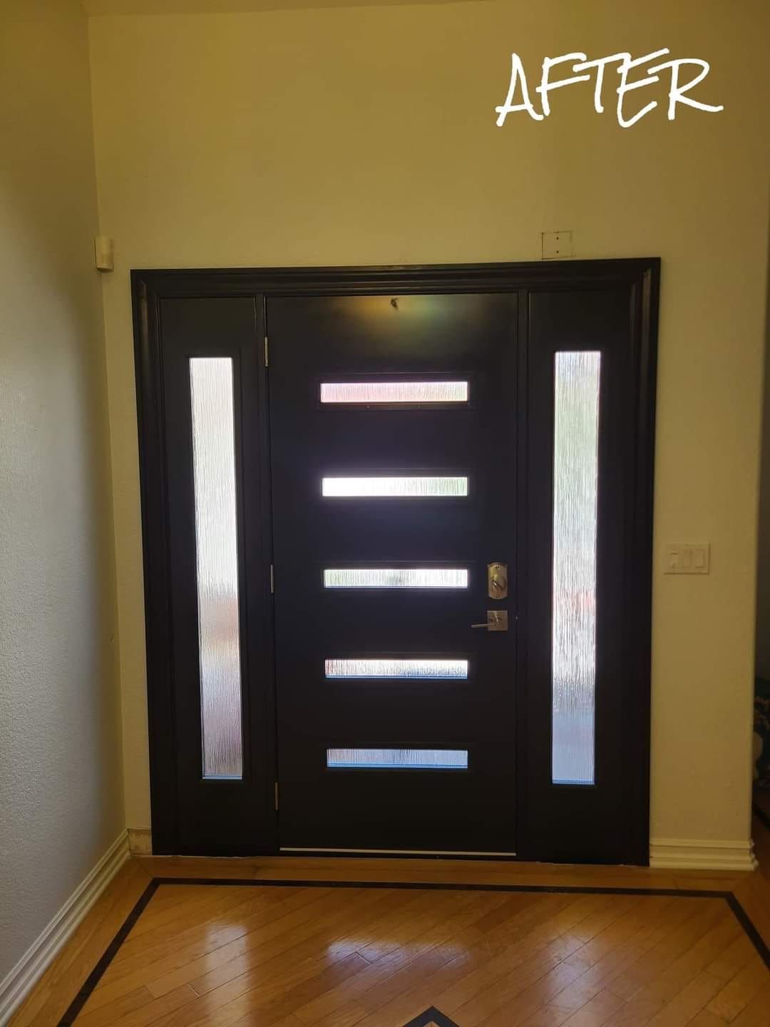 A picture of a door after being painted black