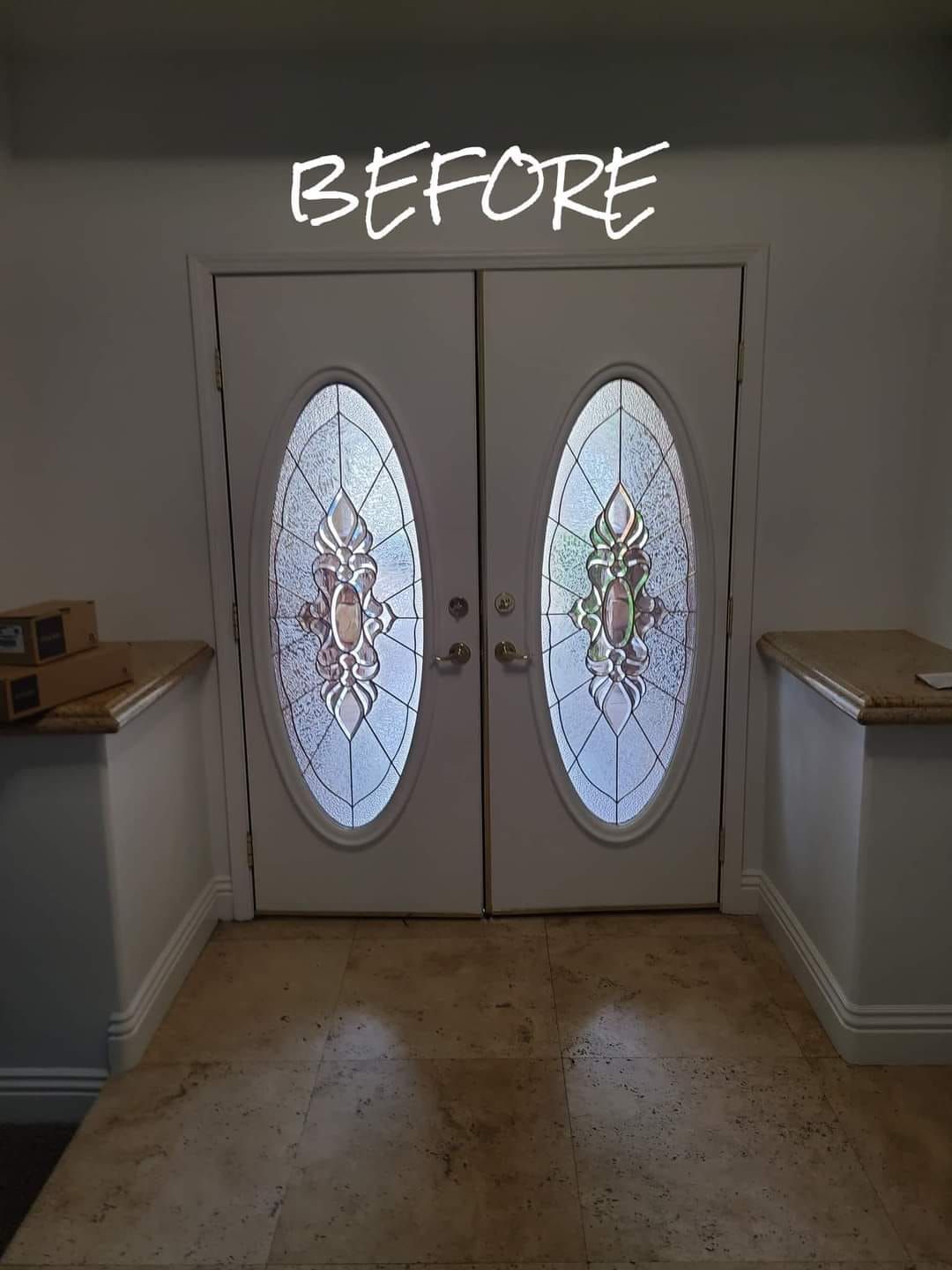 A before picture of a door with stained glass windows