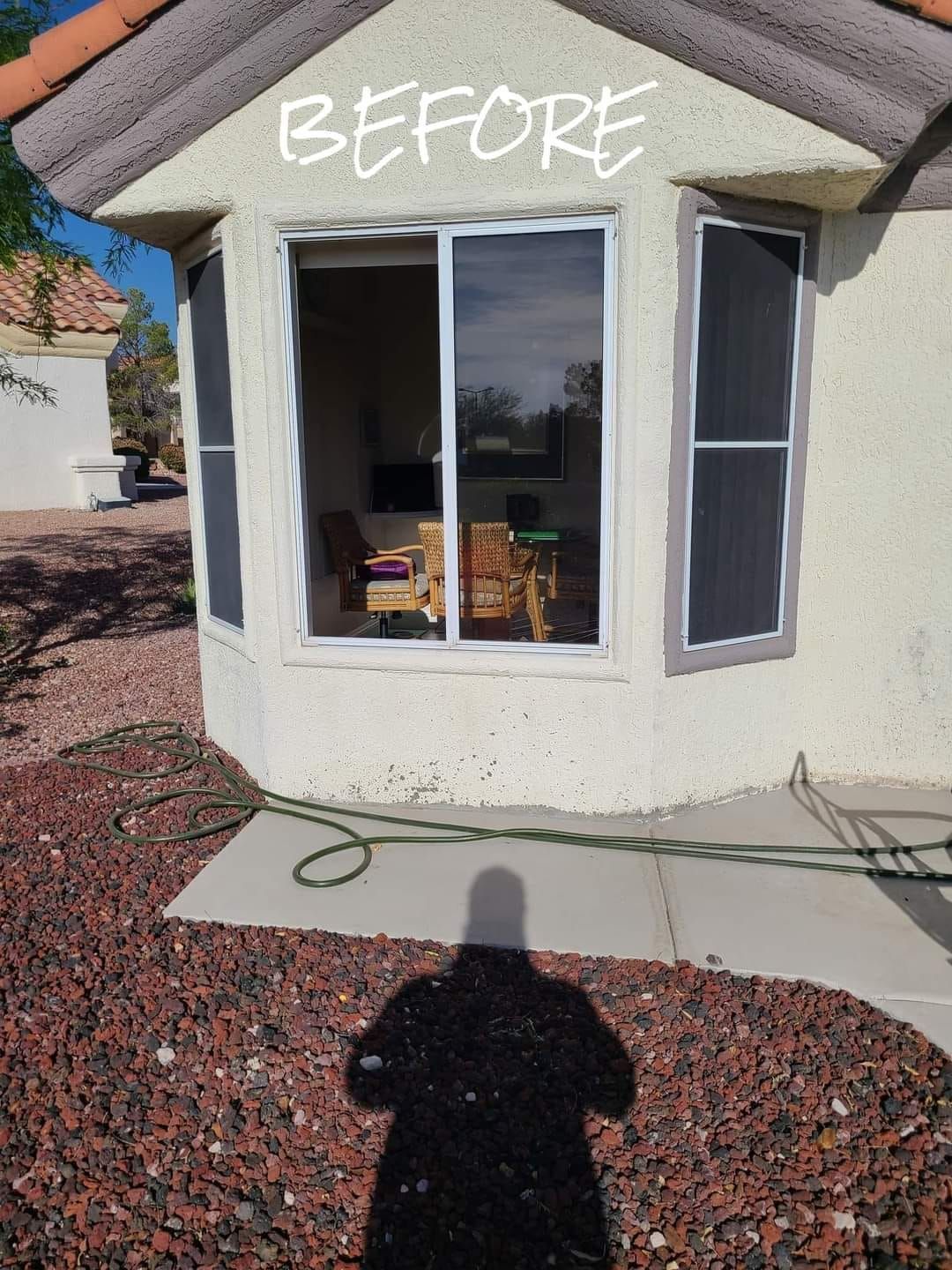 A before picture of a house with sliding glass doors