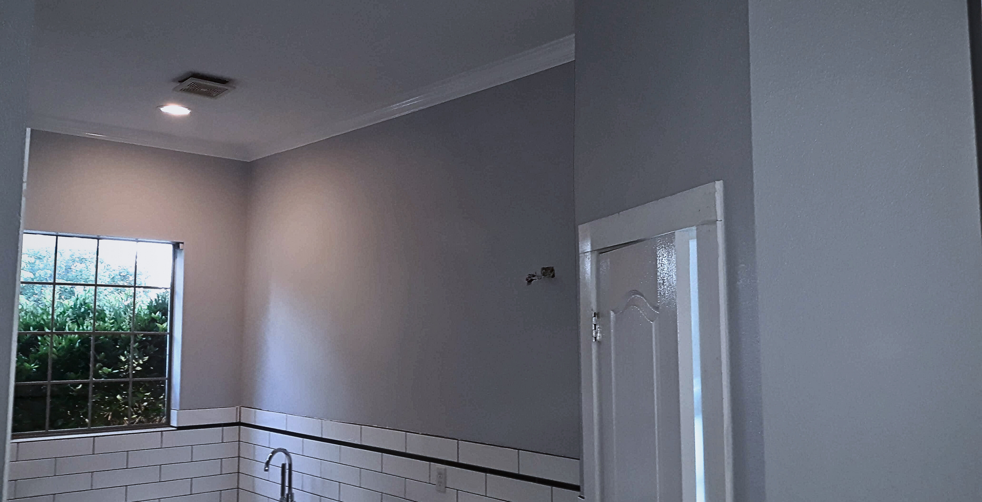bathroom drywall repaired and painted