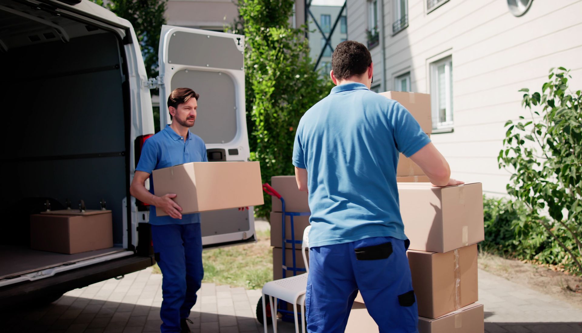Skilled local movers efficiently transporting packages. Skilled local movers efficiently transporting packages.