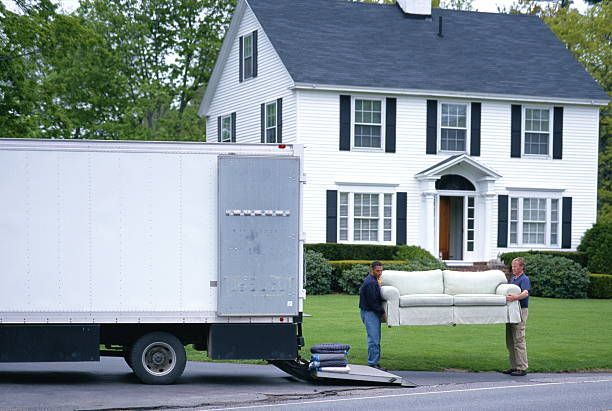 Moving Men Unload Furniture From Truck | Alpharetta, GA - Jason Taylor Moving Moving Men Unload Furniture From Truck | Alpharetta, GA - Jason Taylor Moving
