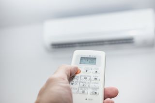 Air Condition Installation — Air Conditioner With Remote Control in Greenville, South Carolina