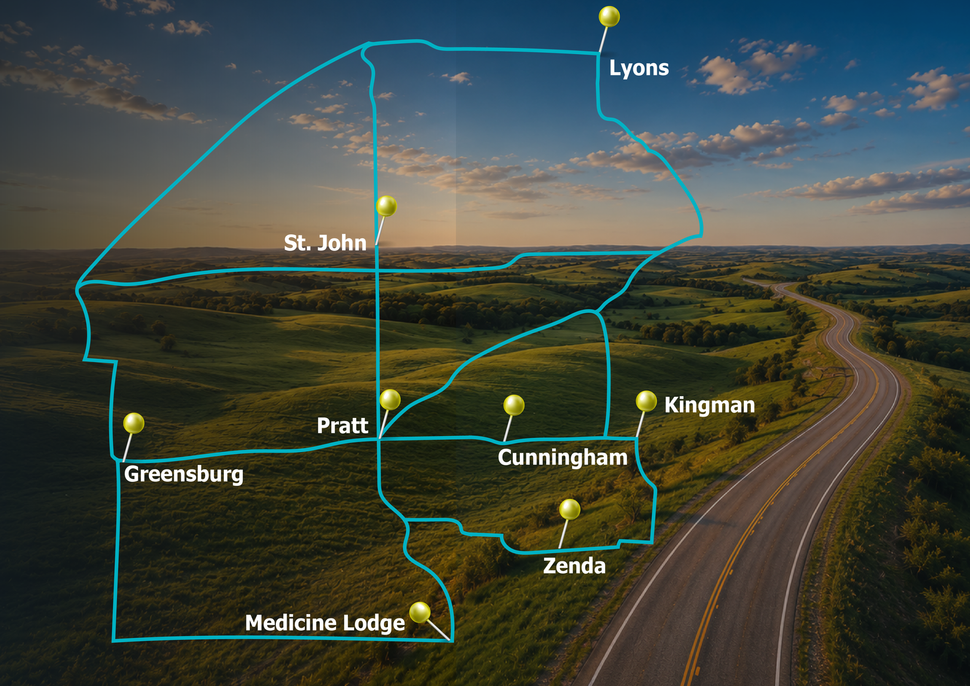 Map overlay with highlighted route and town labels over a highway landscape at sunset.