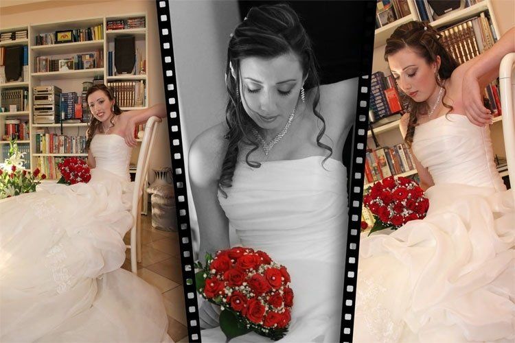 Sposa in posa con bouquet rosso