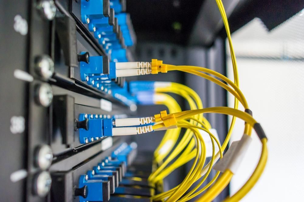 A Bunch of Wires Are Connected to a Server in a Data Center — River City Communications In Melinga, NSW