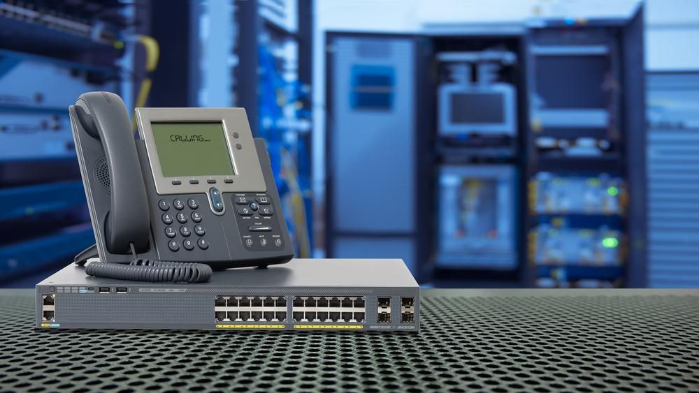 A Telephone is Sitting on Top of a Server in a Server Room — River City Communications In Melinga, NSW