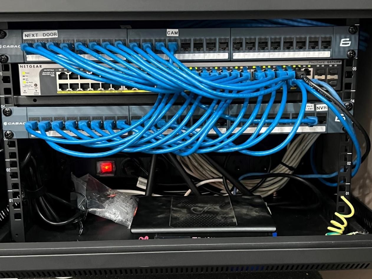 A Bunch of Blue Wires Are Connected to a Server — River City Communications In Melinga, NSW