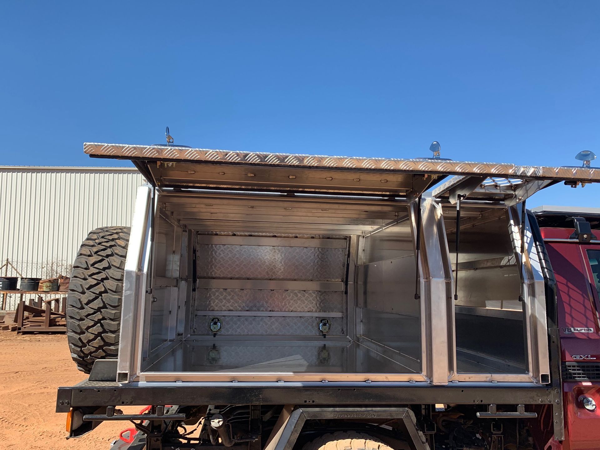 A Large Yellow Metal Next to the Road — Wright's Welding Operations In Ryan, QLD