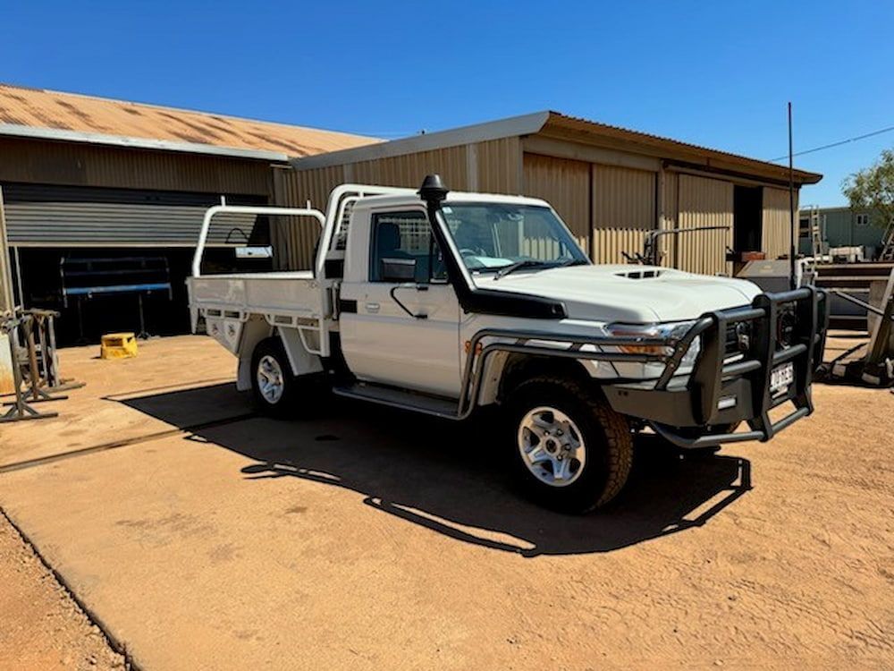 A White Truck Was Park Besides the Road — Wright's Welding Operations In Ryan, QLD