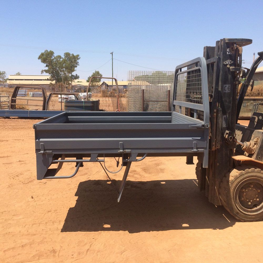 Trailer Trays Lifting Up Using Forklift Equipment — Wright's Welding Operations In Ryan, QLD