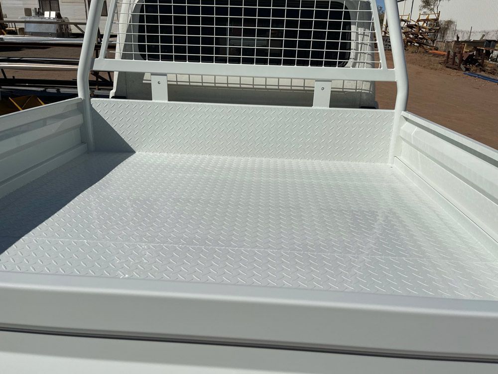 White Flatbed Trailer On The Truck — Wright's Welding Operations In Ryan, QLD