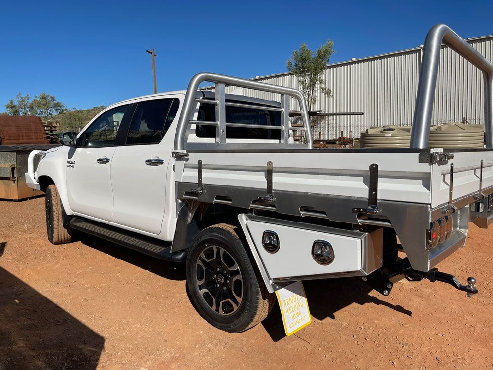 White Toyota Hilux With Fabricated Trays — Wright's Welding Operations In Ryan, QLD
