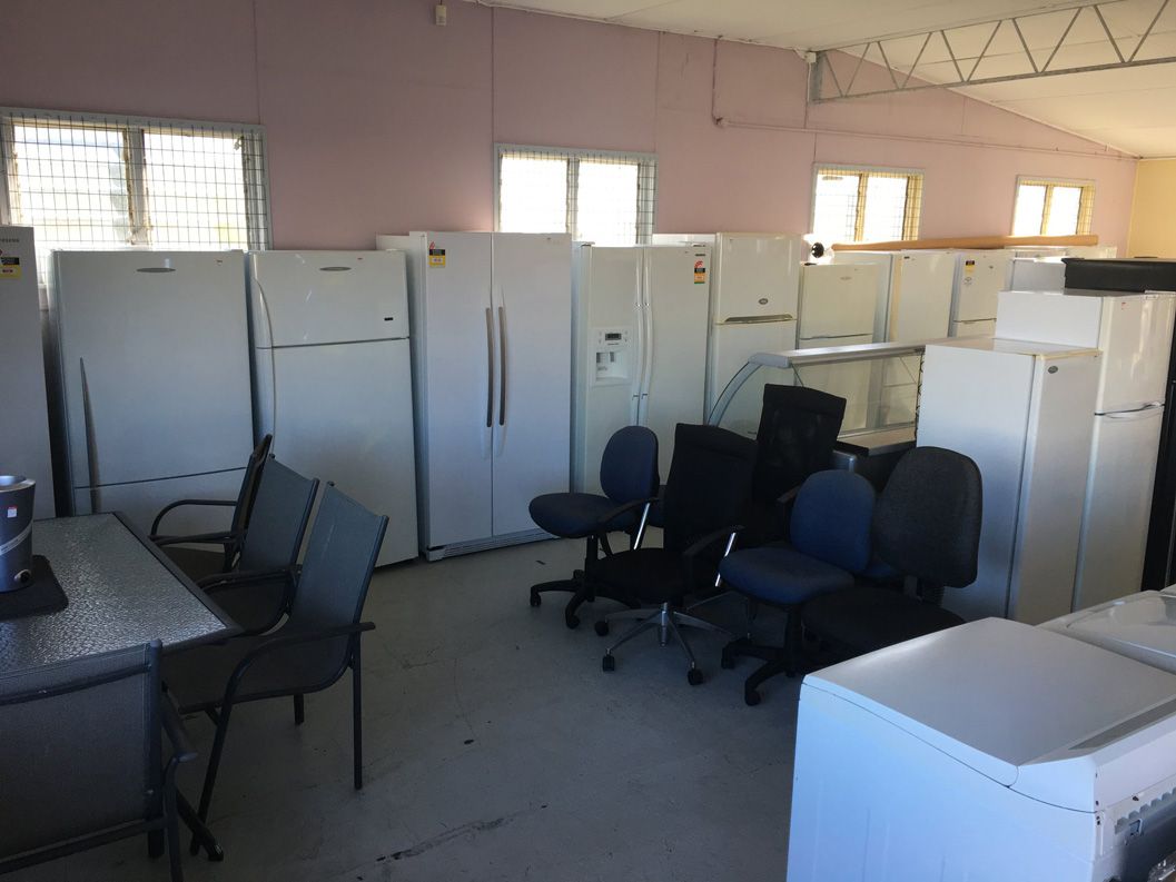 Bunch of Refrigerators and Office Chairs — Cliffy's Cheaper Removals in Taree, NSW
