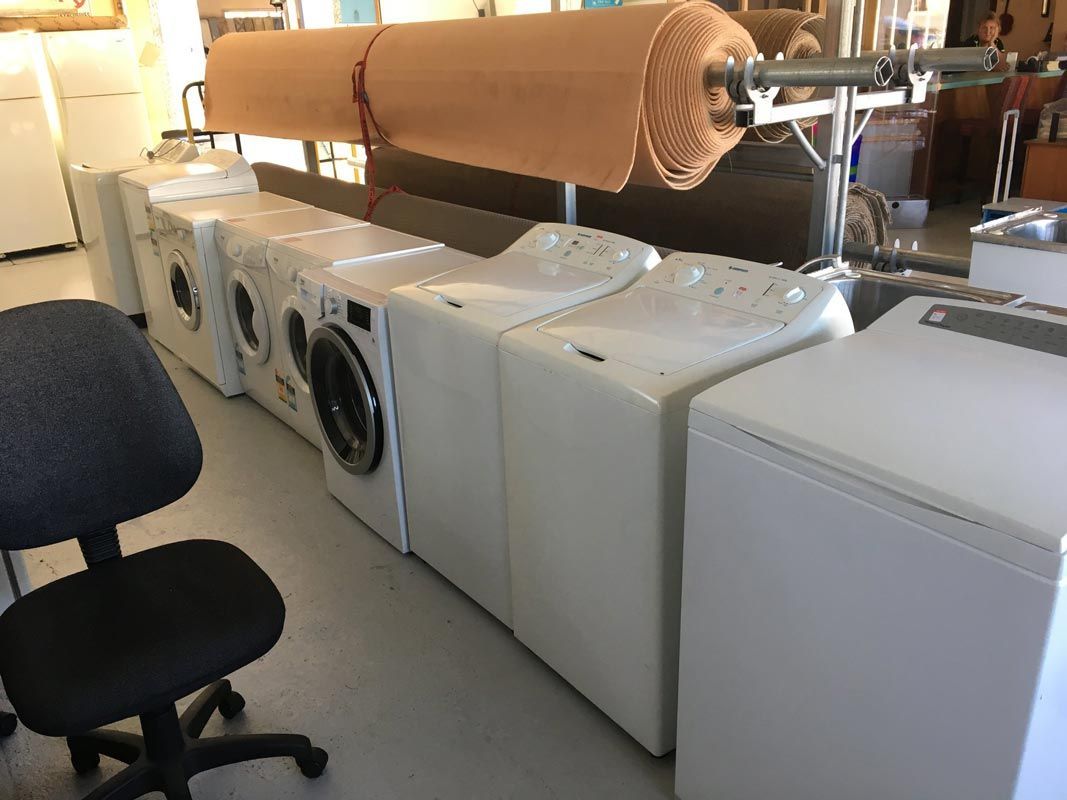 Washing Machines and Black Office Chair — Cliffy's Cheaper Removals in Taree, NSW