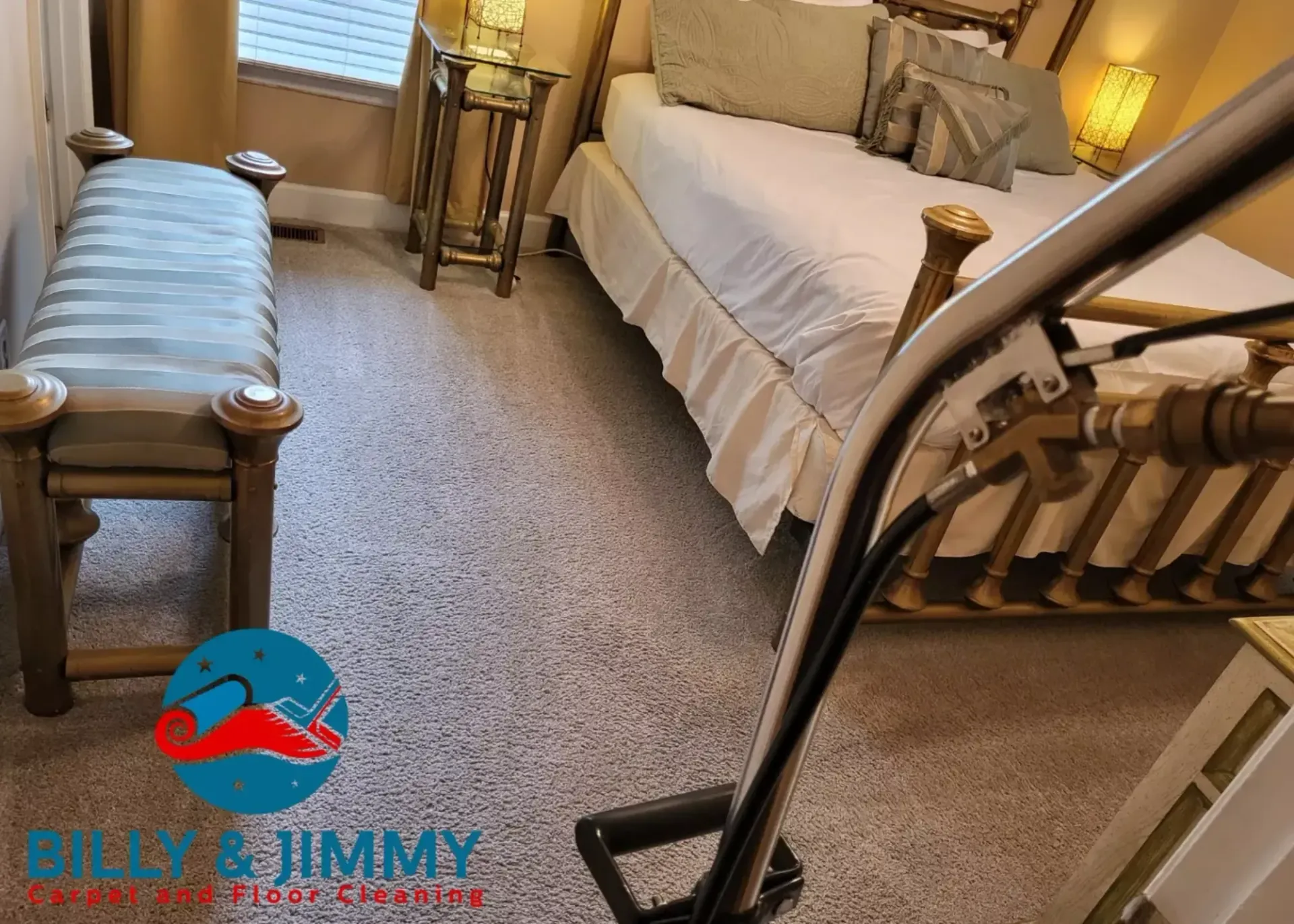 a vacuum cleaner is in a bedroom next to a bed