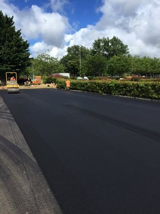 View of the road with chipseal being done