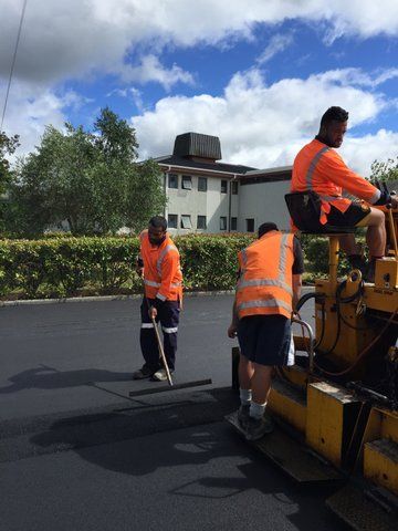 Professional doing the asphalting of road 