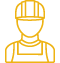 Worker wearing a hard hat and overalls.
