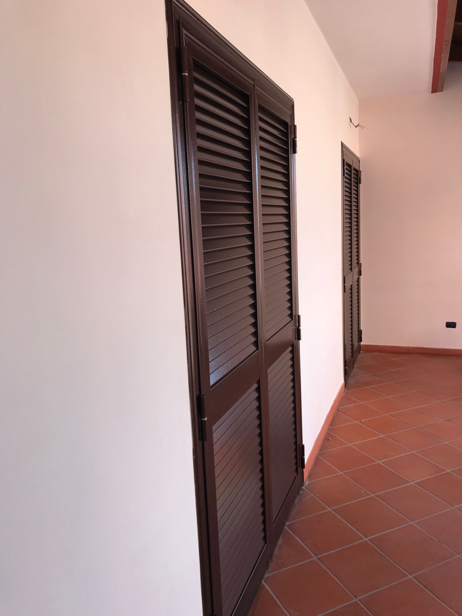 porta finestra con persiana in ferro esterna