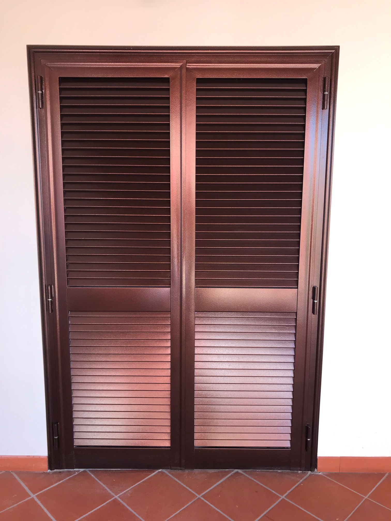 porta finestra con persiana in ferro